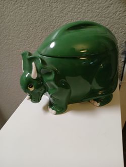Dark green dinosaur cookie jar