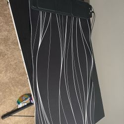 Black Keyboard And Mouse Pad White Wavy With iPhone Charger And AirPod Charger