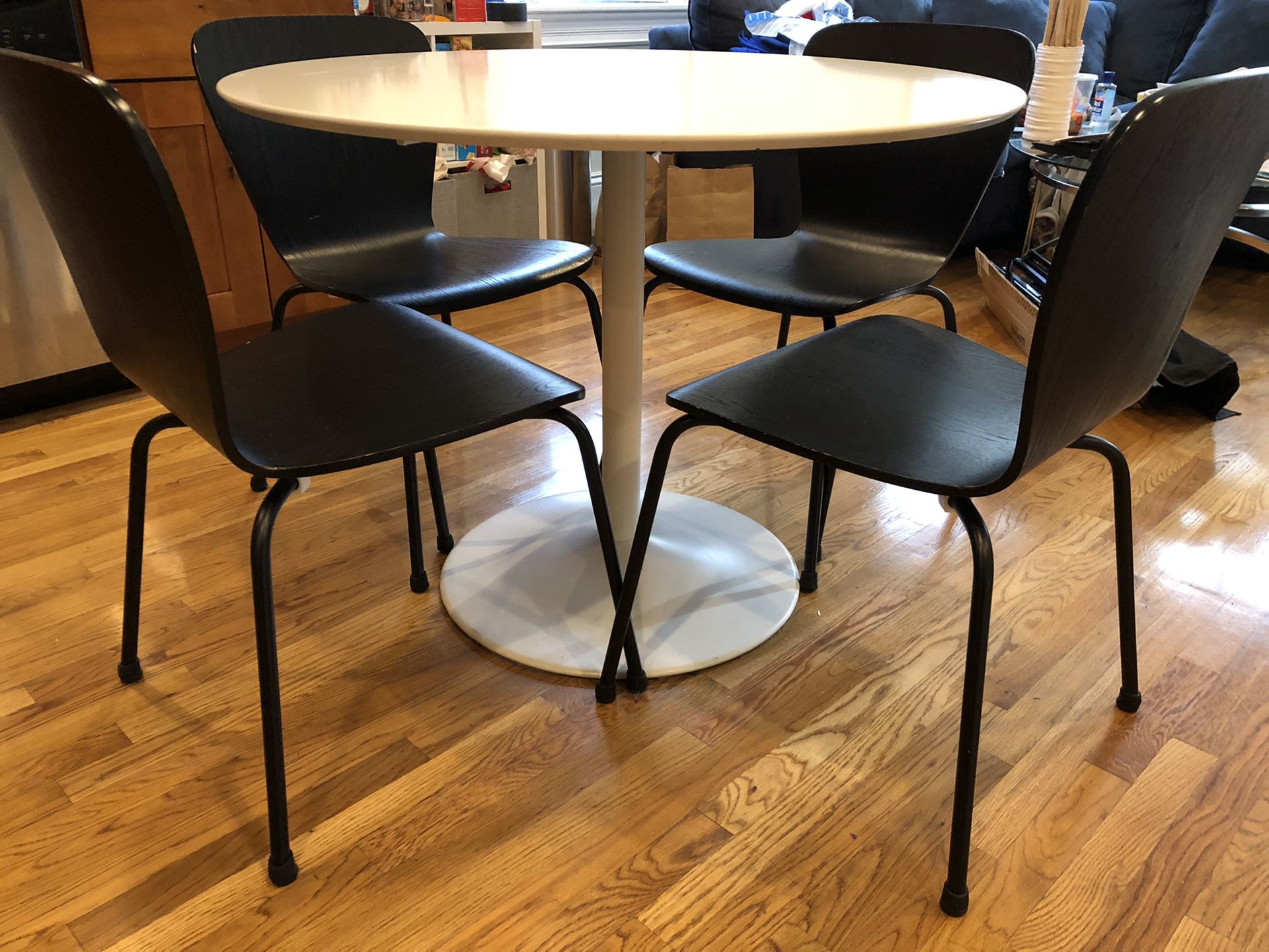 CB2 White Dining Table with Crate and Barrel Black chairs
