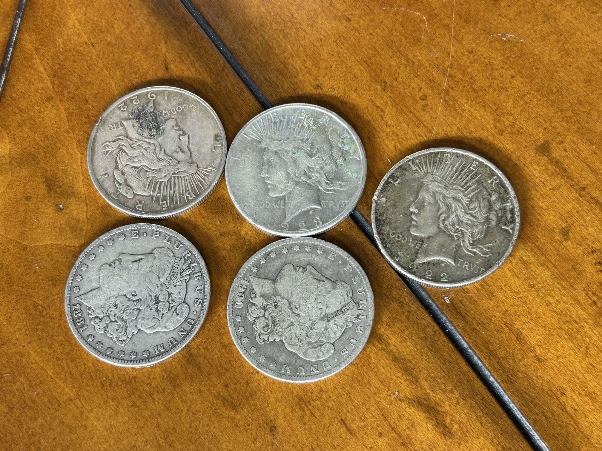 5 Silver Dollars.