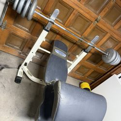 Weight Bench With 76lbs Of Weights And 6 Foot Barbell
