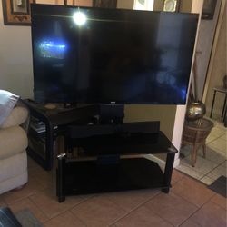 RCA TV With Remote & Black Glass Stand