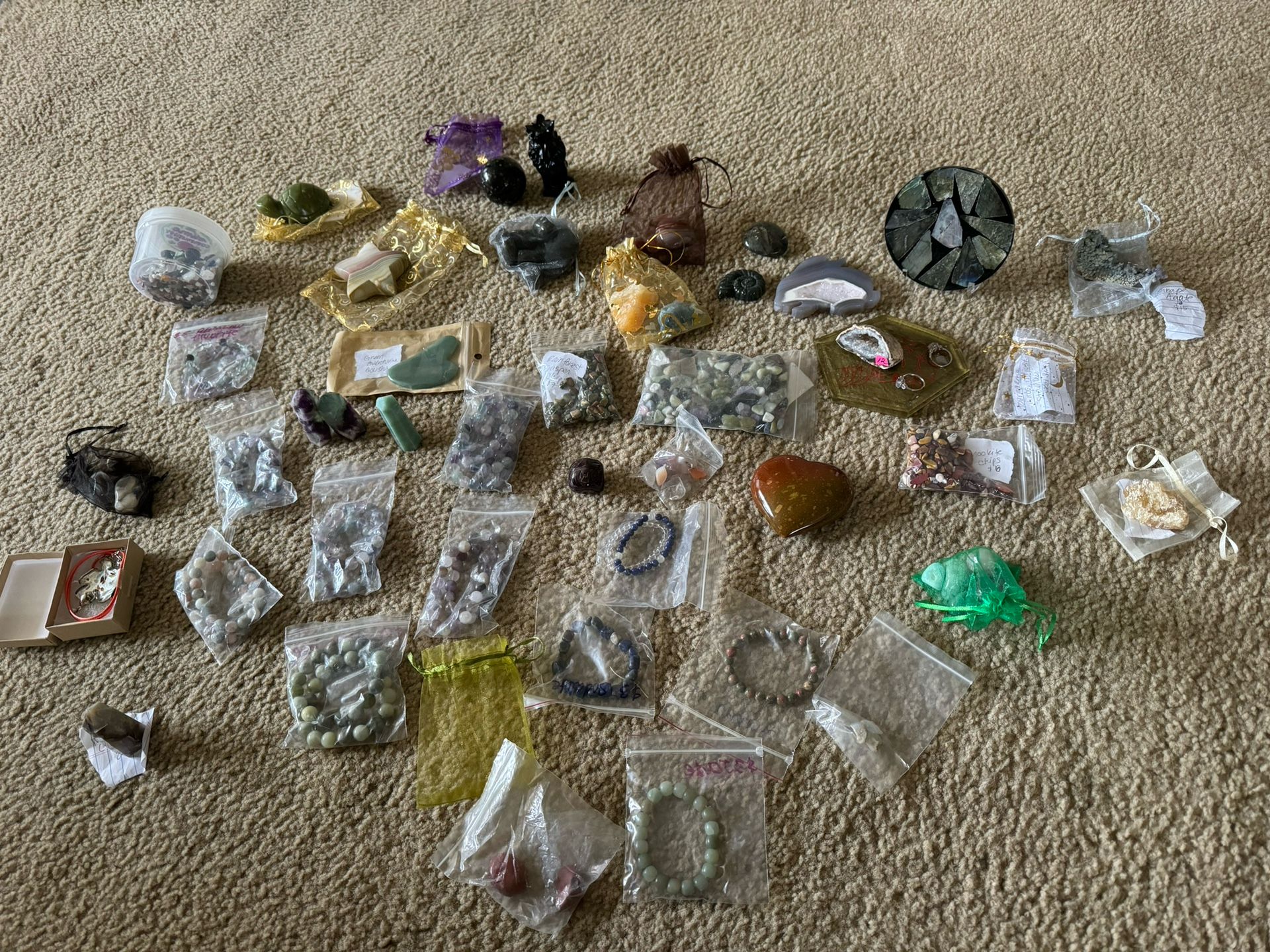 Various Crystals, Rings, And Other Stones