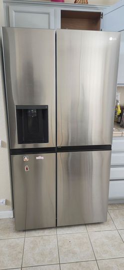 LG 27 cu ft Side-by -Side Refrigerator