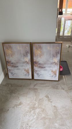 2 canvas prints.  17w x 24 L.
