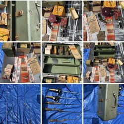 Vintage fishing tackle lot with metal tackle box and assorted gear plus Rods