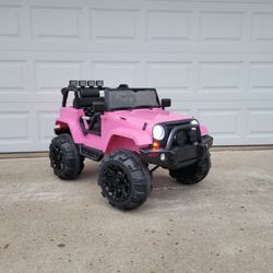 Pink 12v Power Wheels Jeep w/remote 