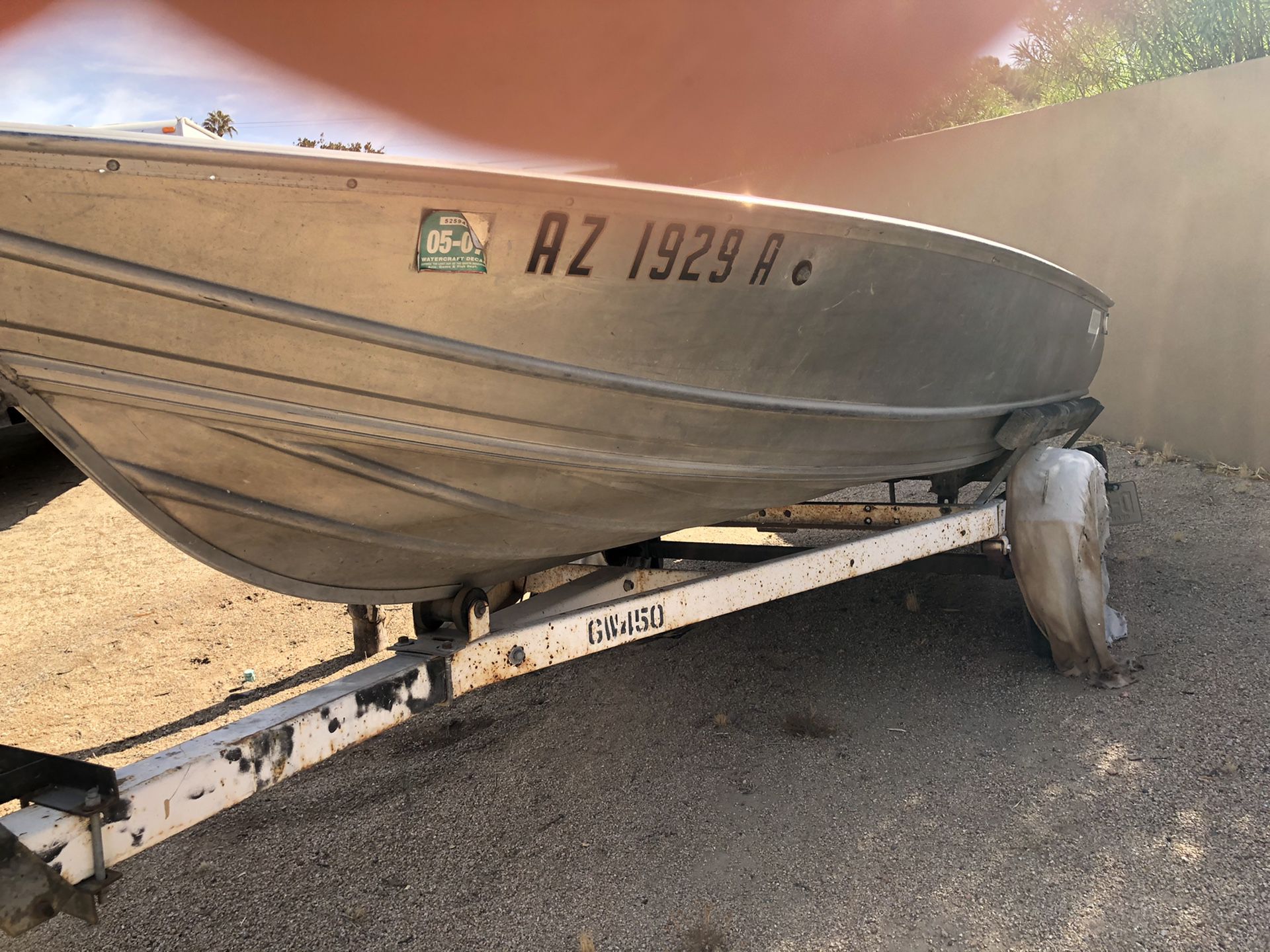 Welded Gregor wide aluminum boat and trailer make offer we don’t use it. With floor deck back trolling plates and seats. Fishing Trade? Titles Thxs