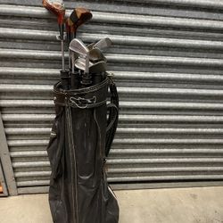 Set Of Golf Clubs And A Bunch Of Golf Balls