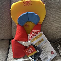 Never-Used Stohlquist Infant Life Jacket