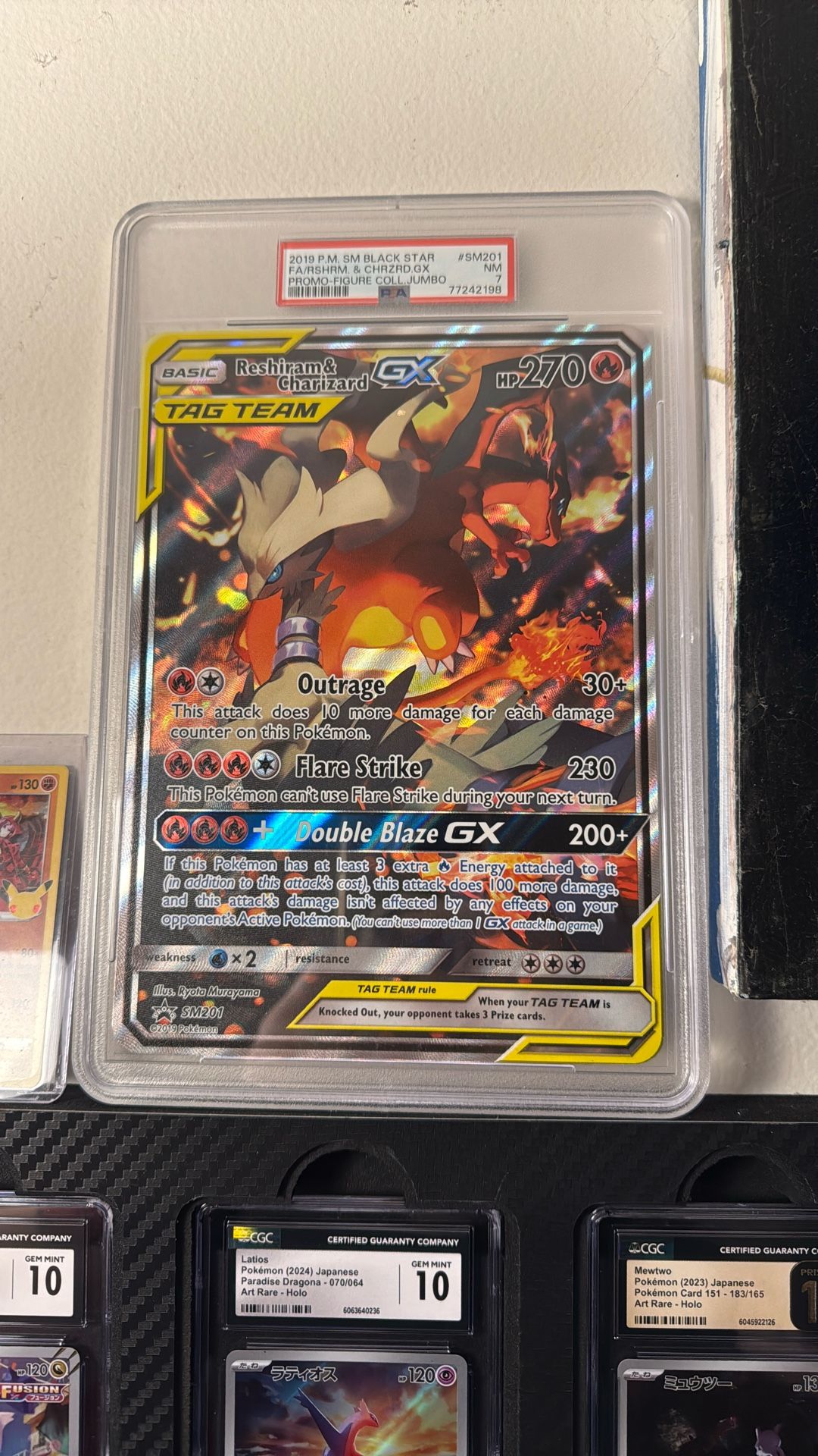 Reshiram & Charizard Tag Team Jumbo PSA 7