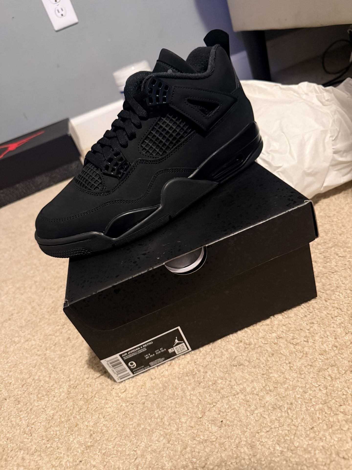 Black Cat Jordan 4s