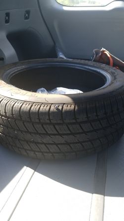 Like new tire 2055516 wity screw