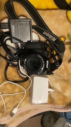 nikon coolpix p100  with charger, card reader, case