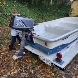 Boat Motor And Trailer $800