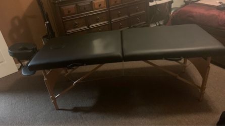 Massage table