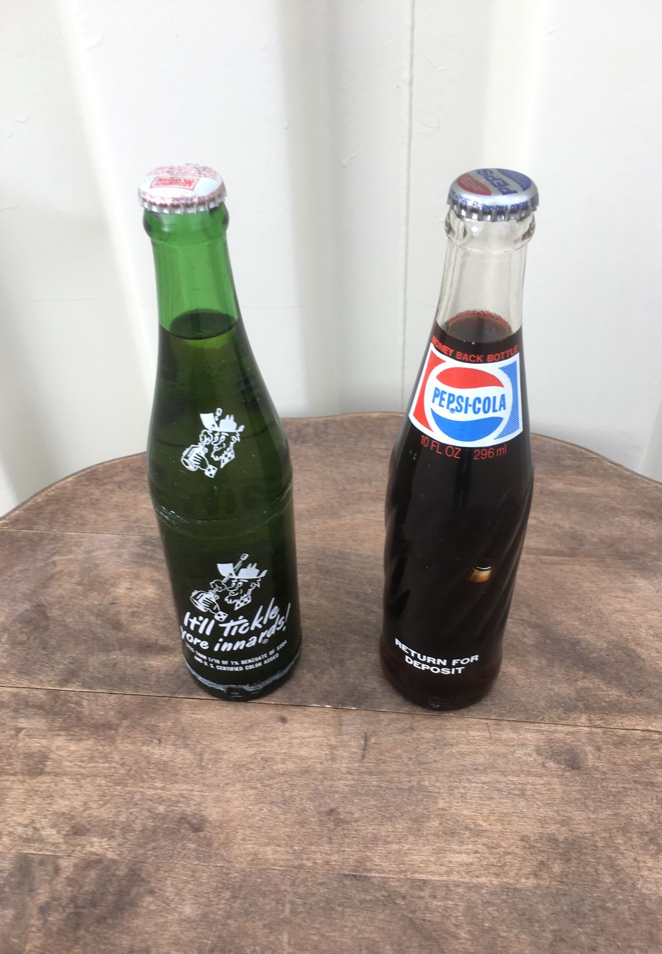 Old Pepsi and Mountain Dew bottles.