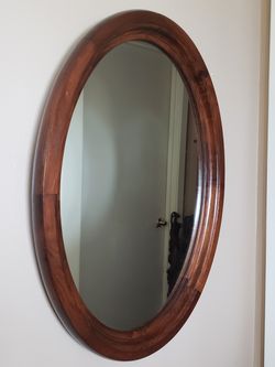 Vintage wood frame oval mirror
