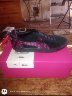 Black and pink Barbie pumas