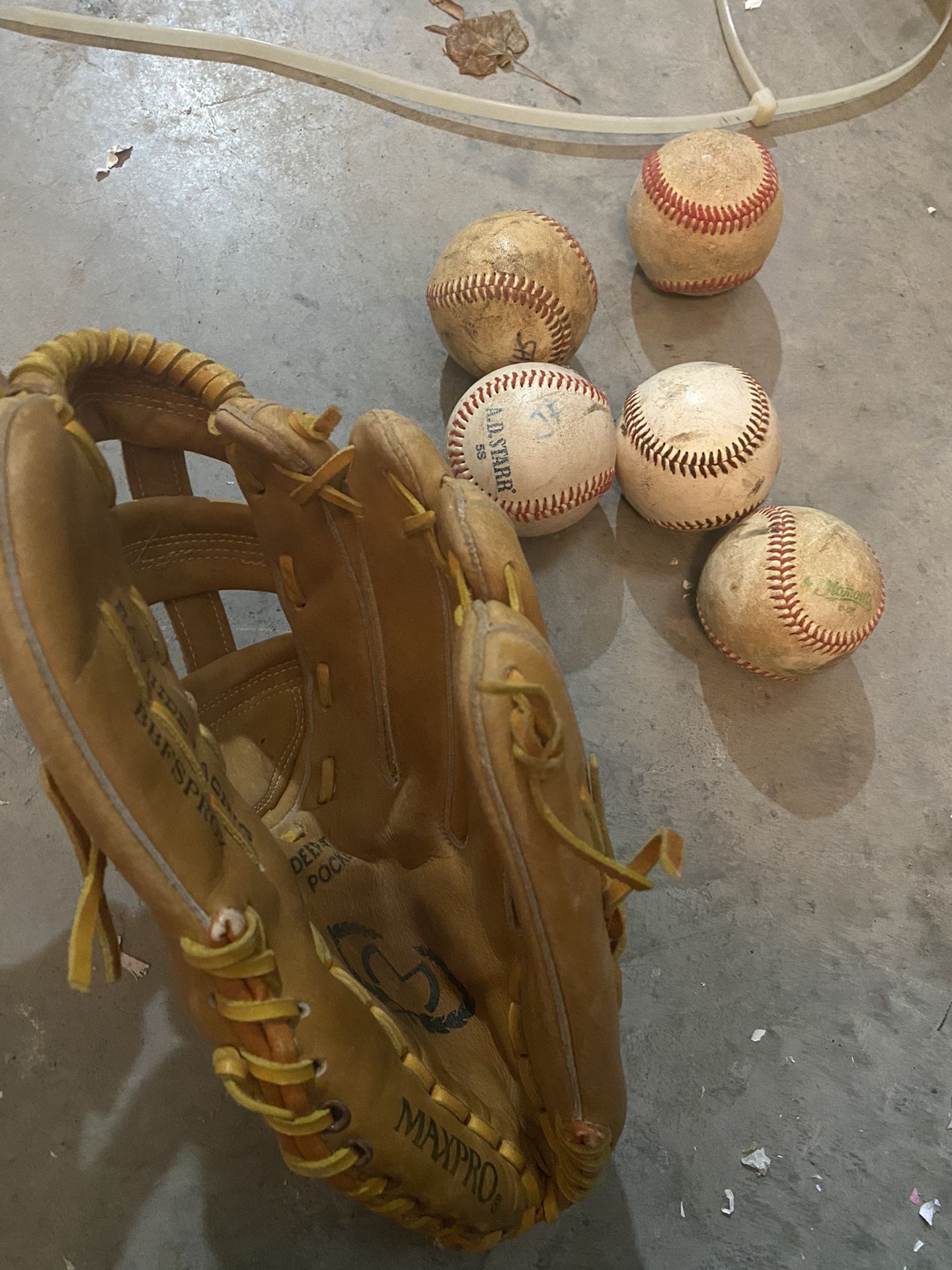 Baseball glove with balls