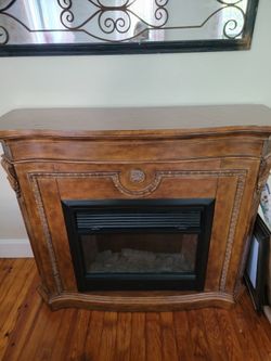Electric fireplace with mantle