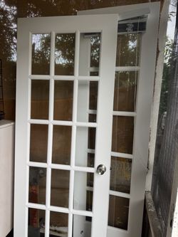 Three wood and glass doors