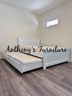 Full bed with trundle and mattresses