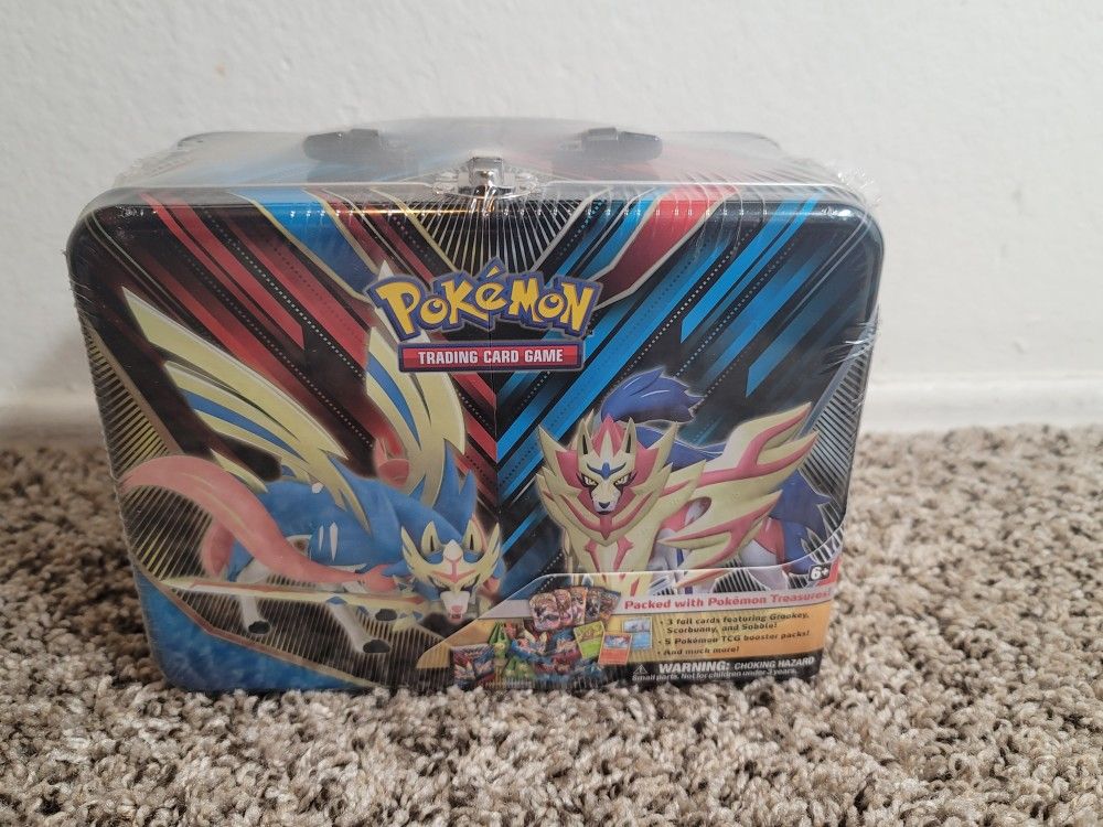 Pokemon TCG Tin Box With 5 Booster Packs And More