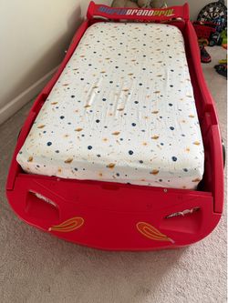 Delta Children racing car twin bed with box spring and mattress