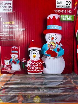 Home Accents Holiday 6ft Animated LED Snowman & Penguin Inflatable