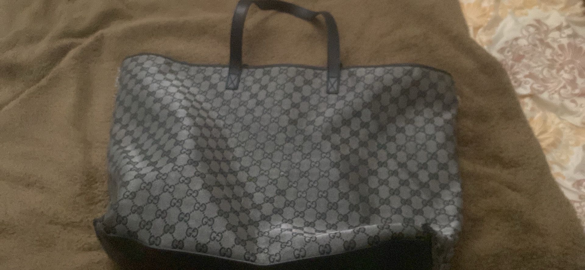 New Black and grey gucci bag good condition fits well and comfortable