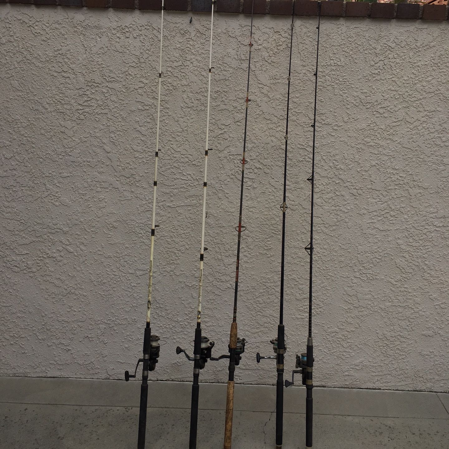Fishing poles, medium duty including reels, 6 foot and 7 foot, $20