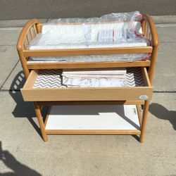 Changing table with brand new padded mattress