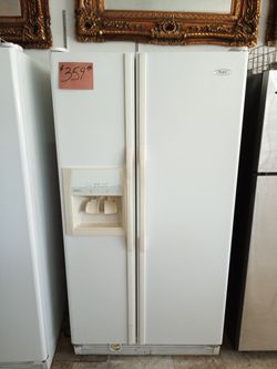 Whirlpool Side by Side Refrigerator White excellent . Warranty , Delivery available 2203 Fowler st. Ft. Myers 33901
