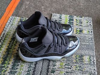 Air Jordan 11 Low Black Patent Leather Space Jam Sneakers