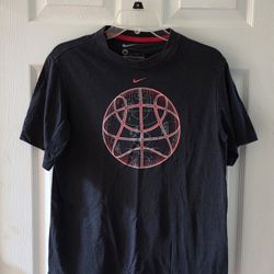 Black Nike basketball tee with red accents