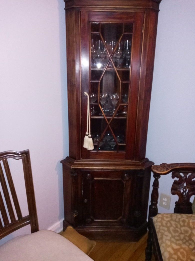 Corner Glass Cabinet.