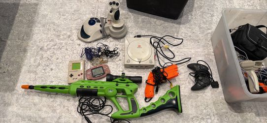 Old game console lot with accessories