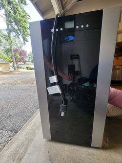 Portable air conditioner. Dual hose