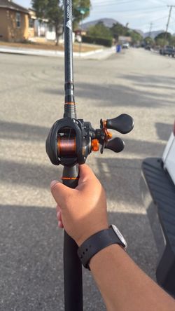 Lews bait caster with ozark trail grit stick