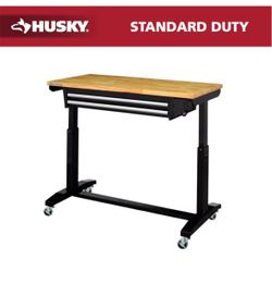 NEW IN BOX Shop Husky Tool Storage 46 in. W x 24 in. D 2-Drawer Adjustable Height Black Worktable with Solid Wood Top