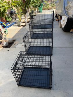 4 dog crates small size 2ft long c 17” wide x19” to$40 and medium size 30” long x 19” wide x 21” top $50 and large size 3 ft long x 22” wide x 25” top