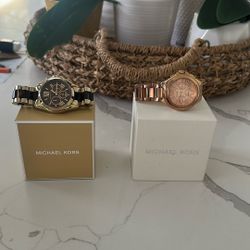 Women’s Michael Kors watches with the box.