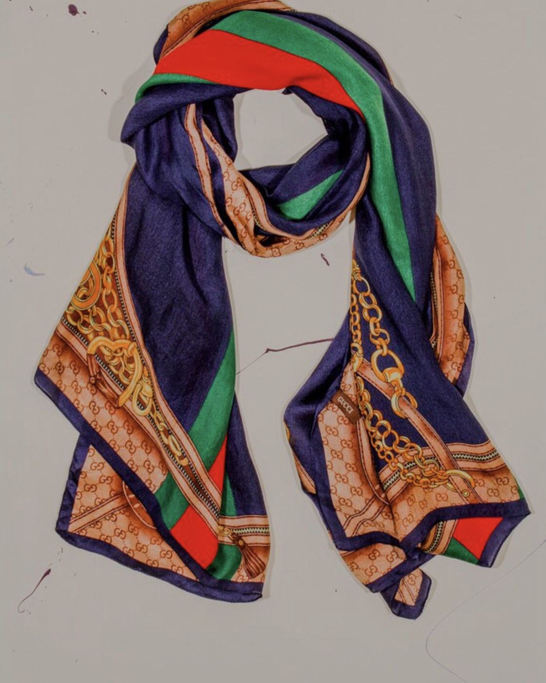 Gucci silk scarf original price is 750$
