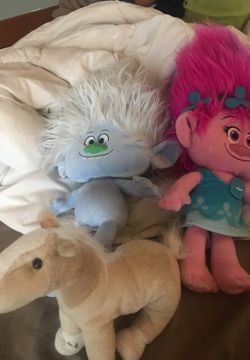 Horse and troll stuffed animals