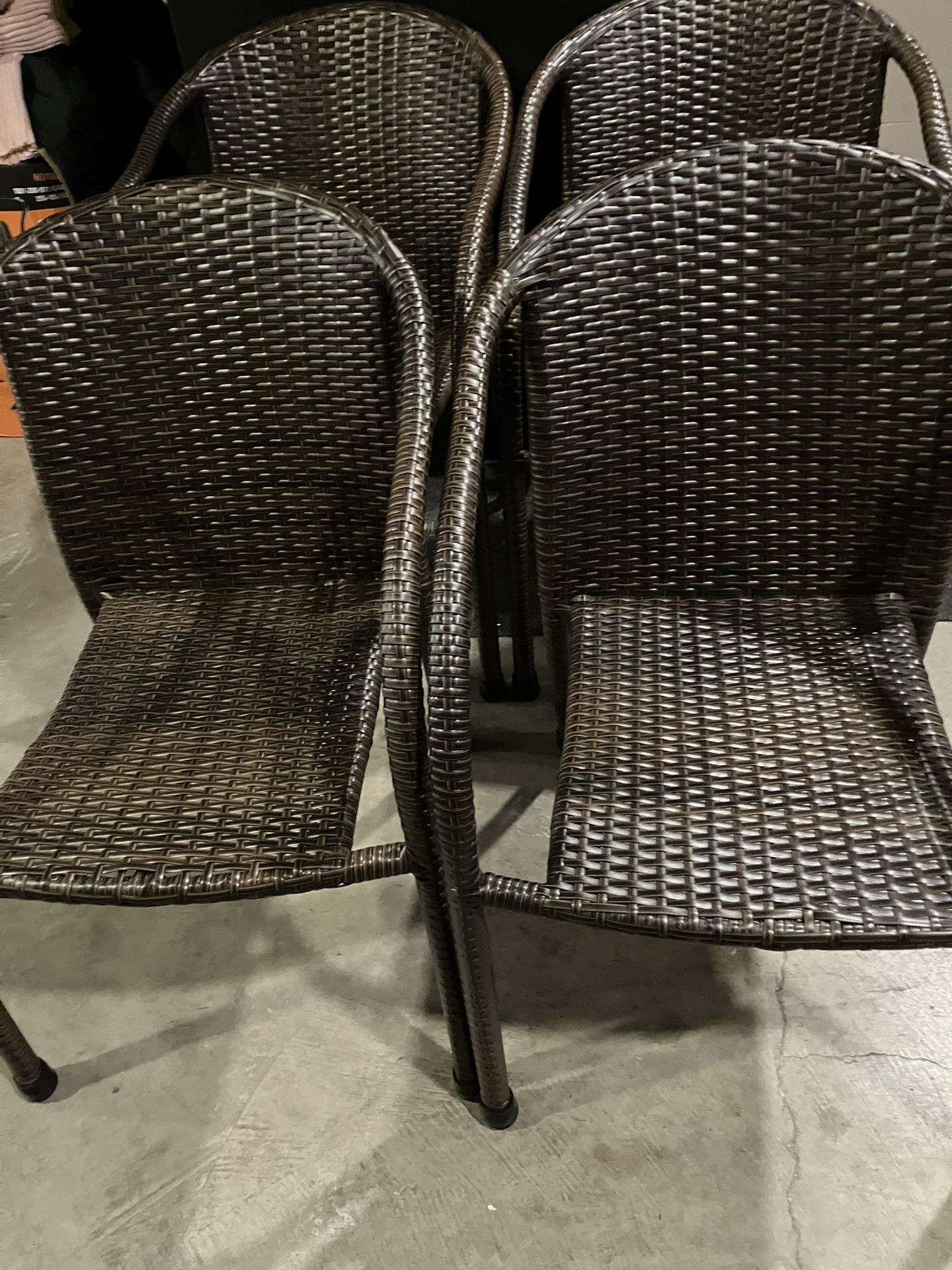 4 Stackable Brown All Weather Wicker/Rattan Outdoor/Dining Chairs W/Steel Frame(See & Click On Pictures). Still In Very Good Condition 