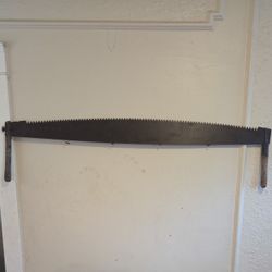 5 Ft. Two- Man Saw. Good Condition.
