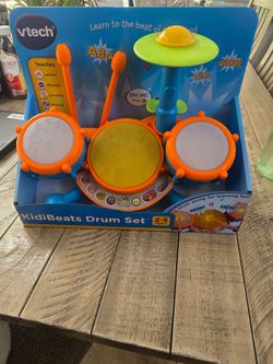 Kidi beats drum