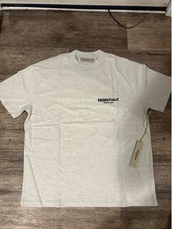 Brand new white essentials shirt size medium