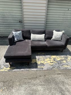 Grey Sectional reversible Chase (Delivery available!)